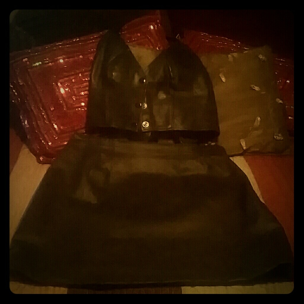 A vintage leather skirt and halter top, motorcycle
